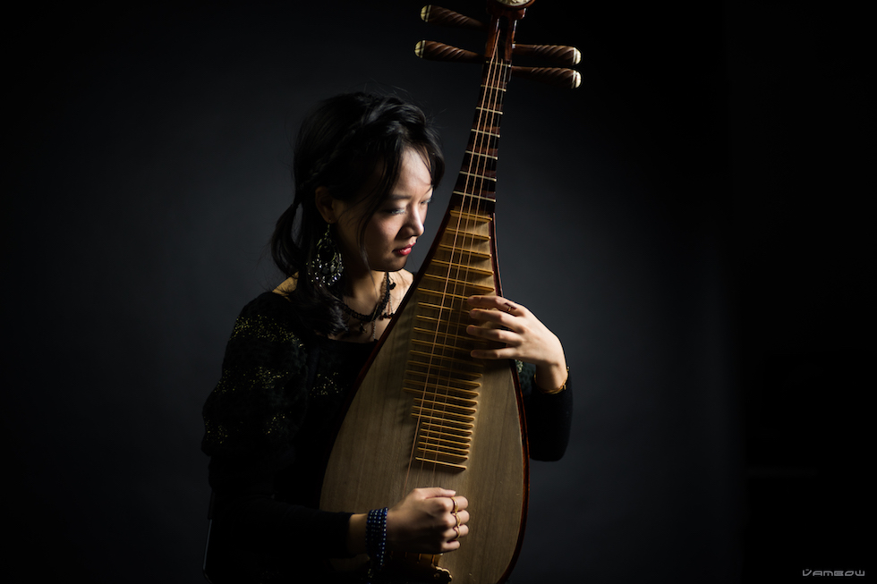 Studio portrait with pipa